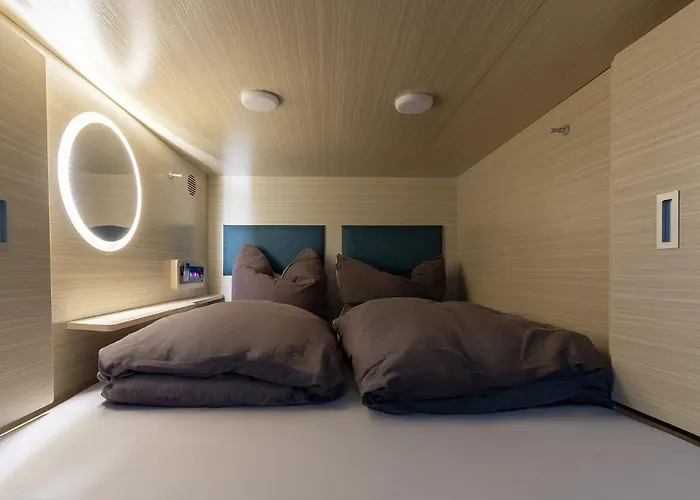 Mue Cubes Kapslový hotel *