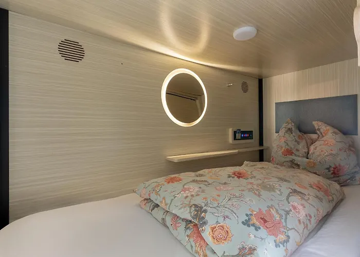 Mue Cubes Kapslový hotel *